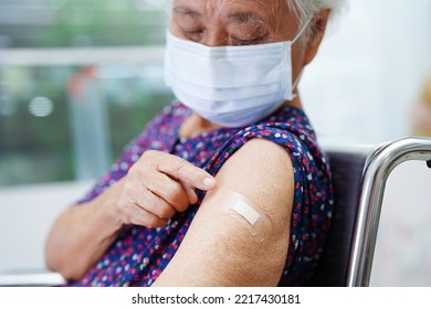 Asian Elder Senior Woman Getting Vaccine For Protect Corona Virus.