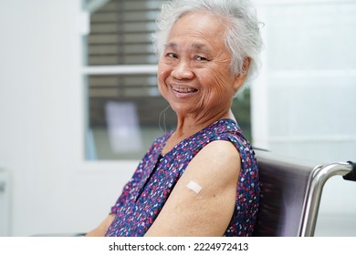 Asian Elder Senior Woman Getting Vaccine For Protect Corona Virus.