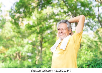 Asian Elderly Man Exercising In The Park