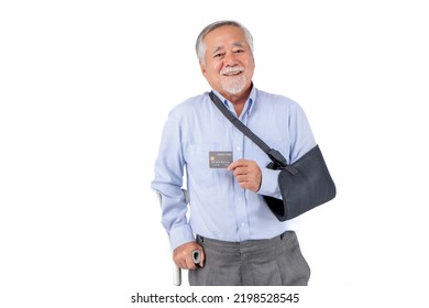 Asian Elderly Man With Hat Broken Arm Wear Arm Splint For Treatment And Smiling And Holding Credit Card For Confident Lifestyle, Old Elderly Male Payment Credit Card Medical Care.