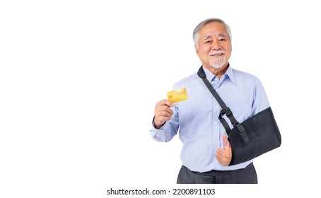 Asian Elderly Man With Hat Broken Arm Wear Arm Splint For Treatment And Smiling And Holding Credit Card For Confident Lifestyle, Old Elderly Male Payment Credit Card Medical Care.