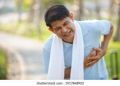 asian elderly or senior man touching chest having painful, men suffering having chest pain. heart attack and healthcare concept. - Shutterstock ID 1917848903