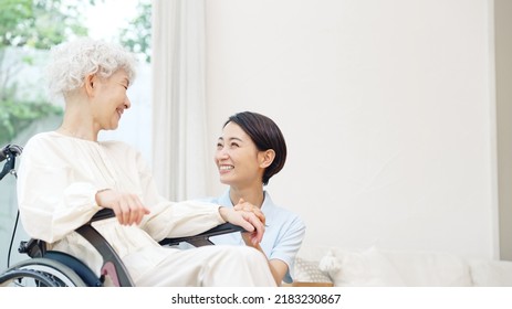 Asian elderly woman and caregiver. nursing care concept. - Shutterstock ID 2183230867