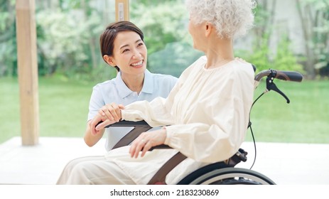 Asian elderly woman and caregiver. nursing care concept. - Shutterstock ID 2183230869