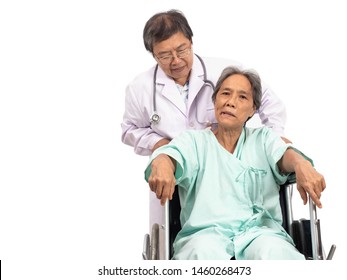 Asian elderly woman with a paralysis, stroke or cerebrovascular accident (CVA) symtoms sitting on wheelchair and the doctor take care. Elderly health care.