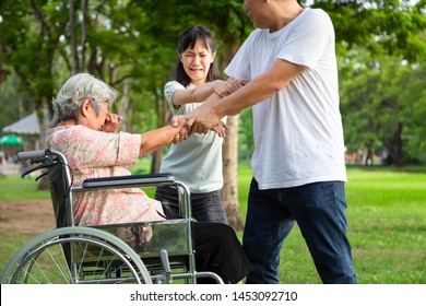 Asian Elderly Woman In Wheelchair Were Physically Abused,attacking In Outdoor,stop Physical Abuse Senior People,angry Man Or Caregiver,family Stop Violence And Aggression Concept