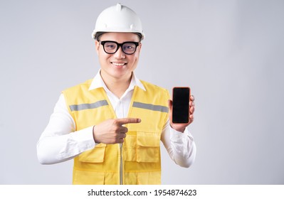 The Asian engineer was pointing at the phone screen

