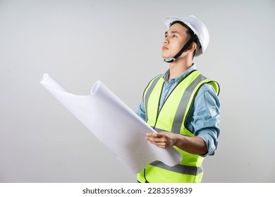 Asian engineer portrait on gray background - Powered by Shutterstock