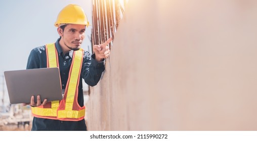 Asian Engineer Using Laptop Computer On Site Construction, Surveyor’s Computer At Construction Site 