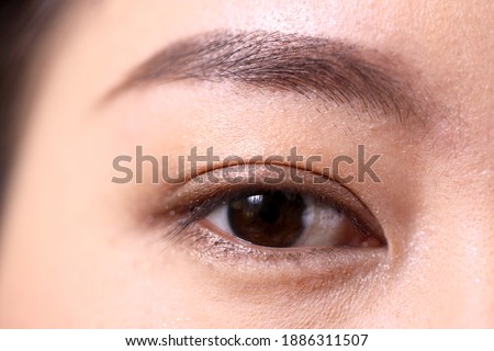The Asian woman’s eyes with make up.