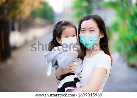 Similar – Image, Stock Photo adorable child girl in lavender field on sunset. smiling kid in sunglasses, jeans jumpsuit is having fun on nature on summer day. Family day, vacation, holiday.International Children’s Day,