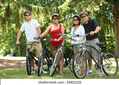 Asian Family With Bicycles