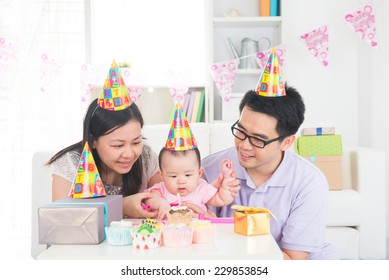 Asian Family Celebrating Full Moon Birthday With Baby