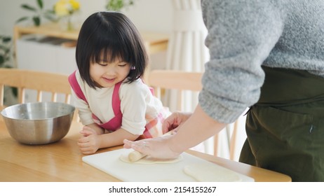 Asian Family Cooking At Home