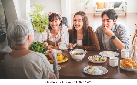 Asian family eating together mother and daughter and son. - Powered by Shutterstock