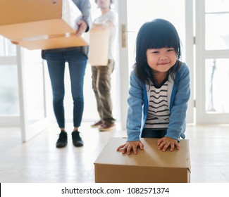 Asian family emoving to new house