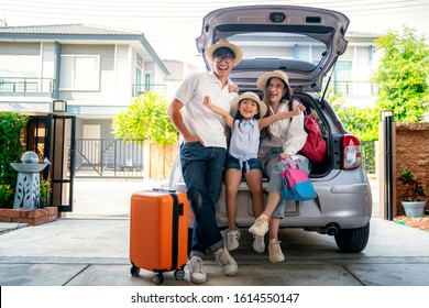 Asian Family going to holiday on summer vacation before start from home. Car travel concept.