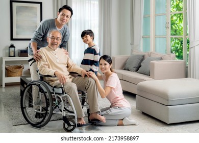 Asian family, grandfather, mother, father and son take a photo togather in living room at home with smile and love emotion - Shutterstock ID 2173958897