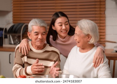 Asian Family Happiness in the Kitchen: Senior Parents Cooking Dinner with Joy, Children Laughing, A Fun and Loving Atmosphere of Togetherness, Creating Delicious Meals and Beautiful Memories - Powered by Shutterstock