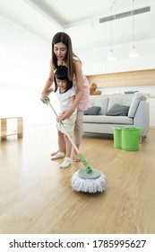 Asian Family Happy With Cleaning Floor Home Together, Parent Teach And Training Little Girl For Help House Keeping, Kids Chore Concept.
