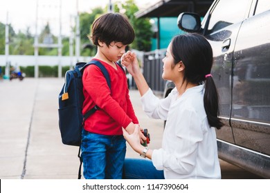 Asian Family Happy Parent Mother Mom Talk To Her Son After Send Children Kid Son Boy Kindergarten To School, Education Back To School Concept