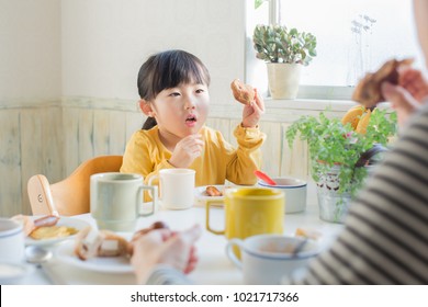asian family having breakfast