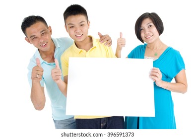  Asian Family Holding Blank White Board On White Background.