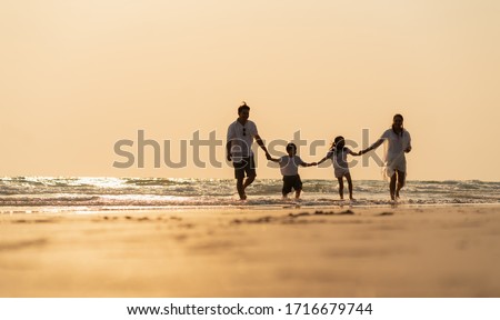 Asian family holidays at the beach. A happy family in asia Traveling, resting after the virus crisis, living life with family