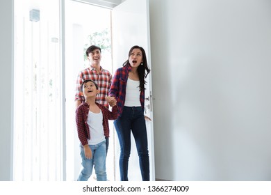 Asian Family With Kid Amazed By Their New Home To Be