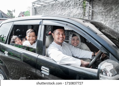 Asian Family And Kids In The Car On Holiday