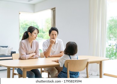 Asian Family In Modern Interior. Lifestyle Concept.