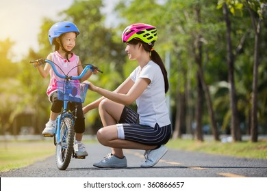 mom and child bike