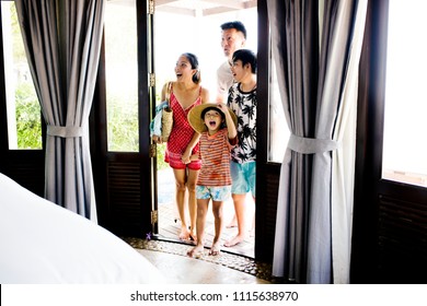 Asian Family On Vacation