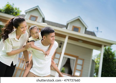 Asian Family Portrait With Happy People Smiling