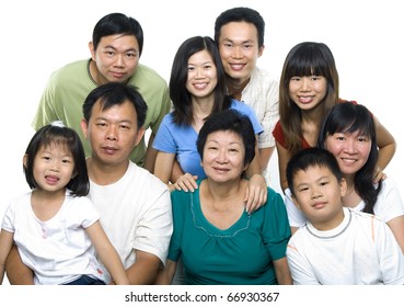 Asian Family Portrait On White Background, 3 Generations.