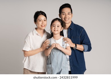 Asian family portrait posing on white background