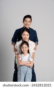 Asian family portrait posing on white background
