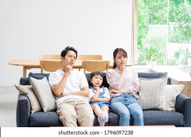 Asian Family Portraits At Home