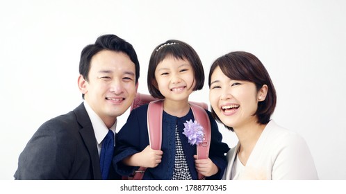 Asian Family Shooting A Commemorative Photo. Photo Studio.