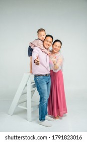 asian family smile to the camera - Shutterstock ID 1791823016