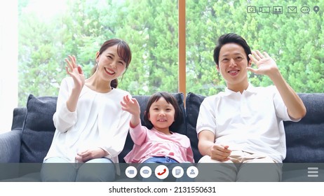 Asian Family Talking On A Two-screen Video Call. Video Phone.