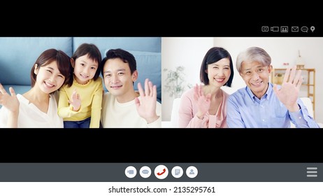 Asian Family Talking On A Two-screen Video Call. Video Phone.