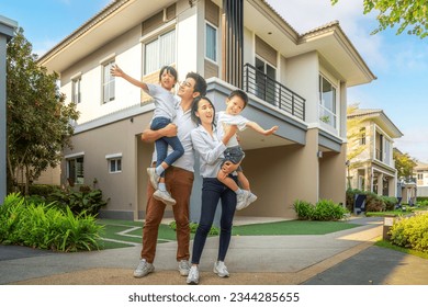 Asian family walking togather with Mother father and daughter in home village, Park in Bangkok city, Thailand - Powered by Shutterstock