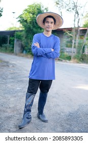 Asian Farmer Man Smile Cross Arms Standing At Farm. Full Body Image.