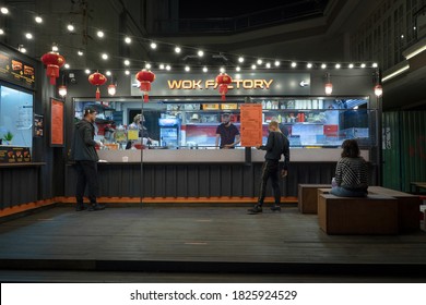 Asian Fast Food Restaurant. People Are Queuing Up For Wok. Restaurant Chinese Food Concept. High Quality Photo. June 2020. Kyiv, Ukraine.