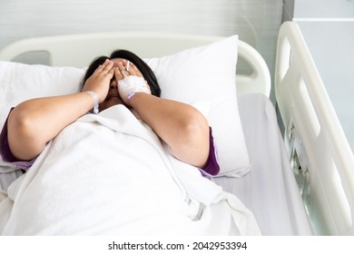 Asian Fat Woman Patient Feeling Sad And Depressed Lying At Hospital Bed