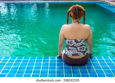 Fat girl swimming