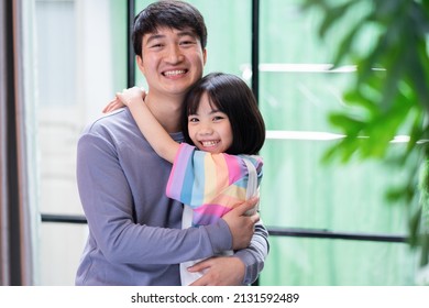 Asian Father And Daughter At Home