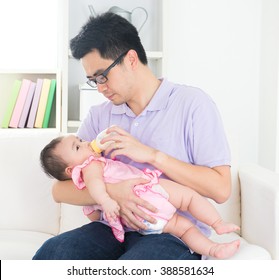 asian father nursing