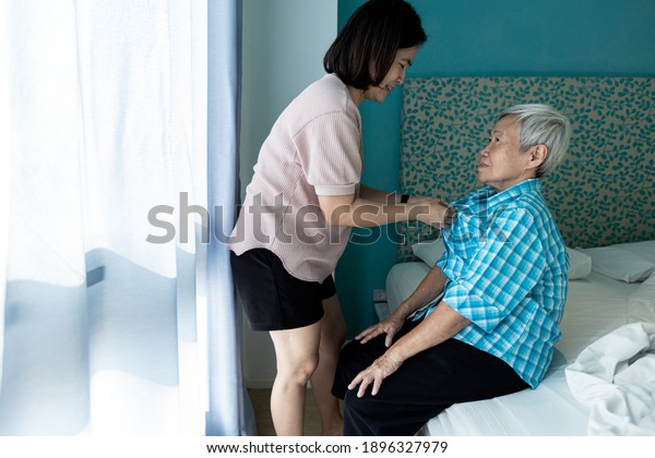 Asian Female Caregiver Taking Care Helping Stock Photo 1896327979